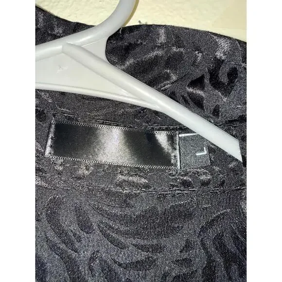 Black patterned long sleeve button-up shirt size L - Picture 3 of 3